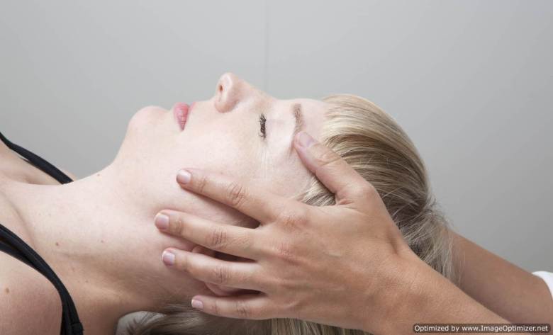 woman receiving craniosacral therapy